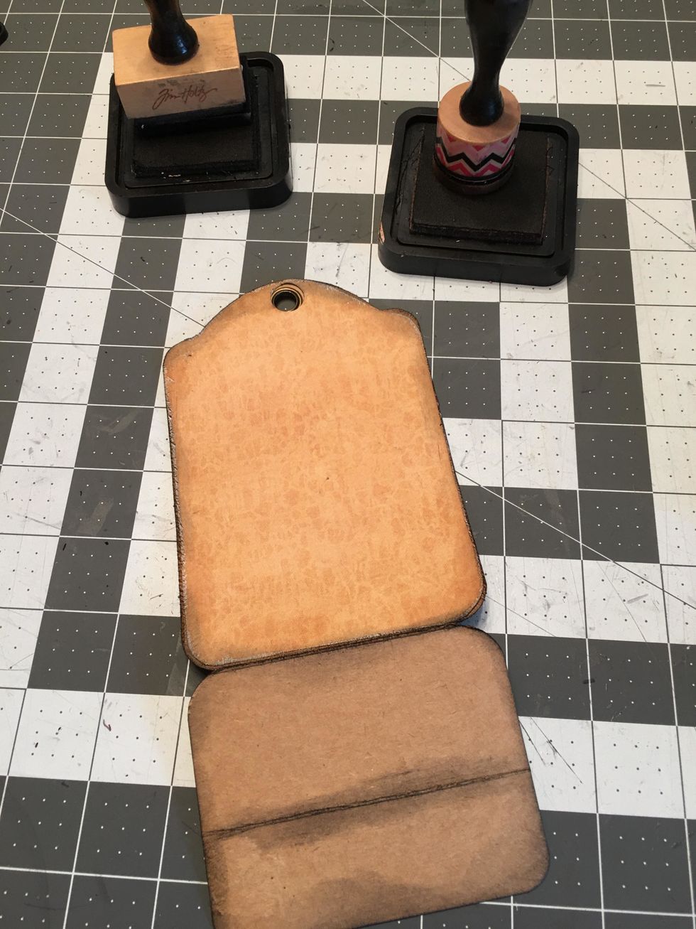 Turn the tag over. Pattern the top part as shown to match the front tag.