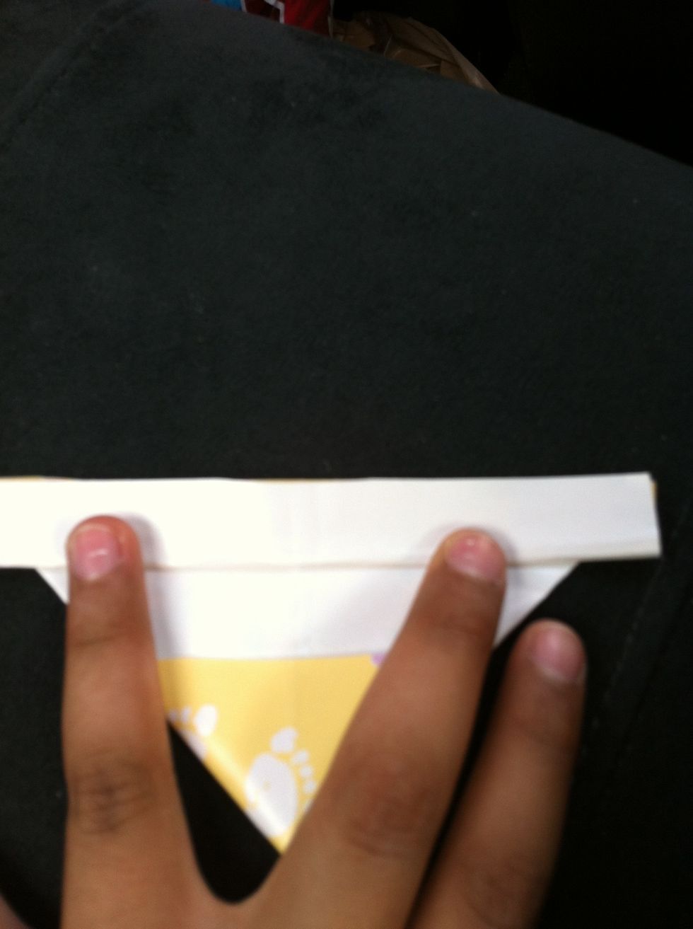 Turn to the back and fold to the top