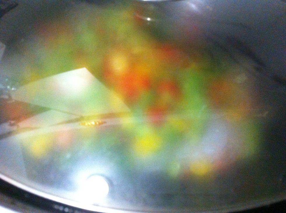 Turn up the heat, add a dash of white wine or prosecco, and cover