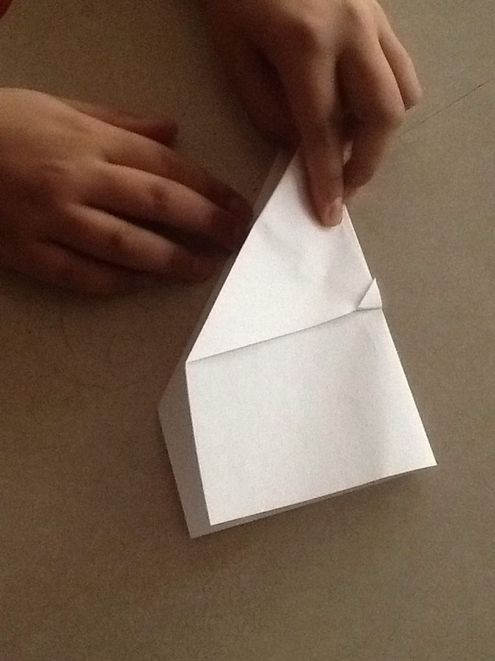 Turn your air plane up side down and fold it in half