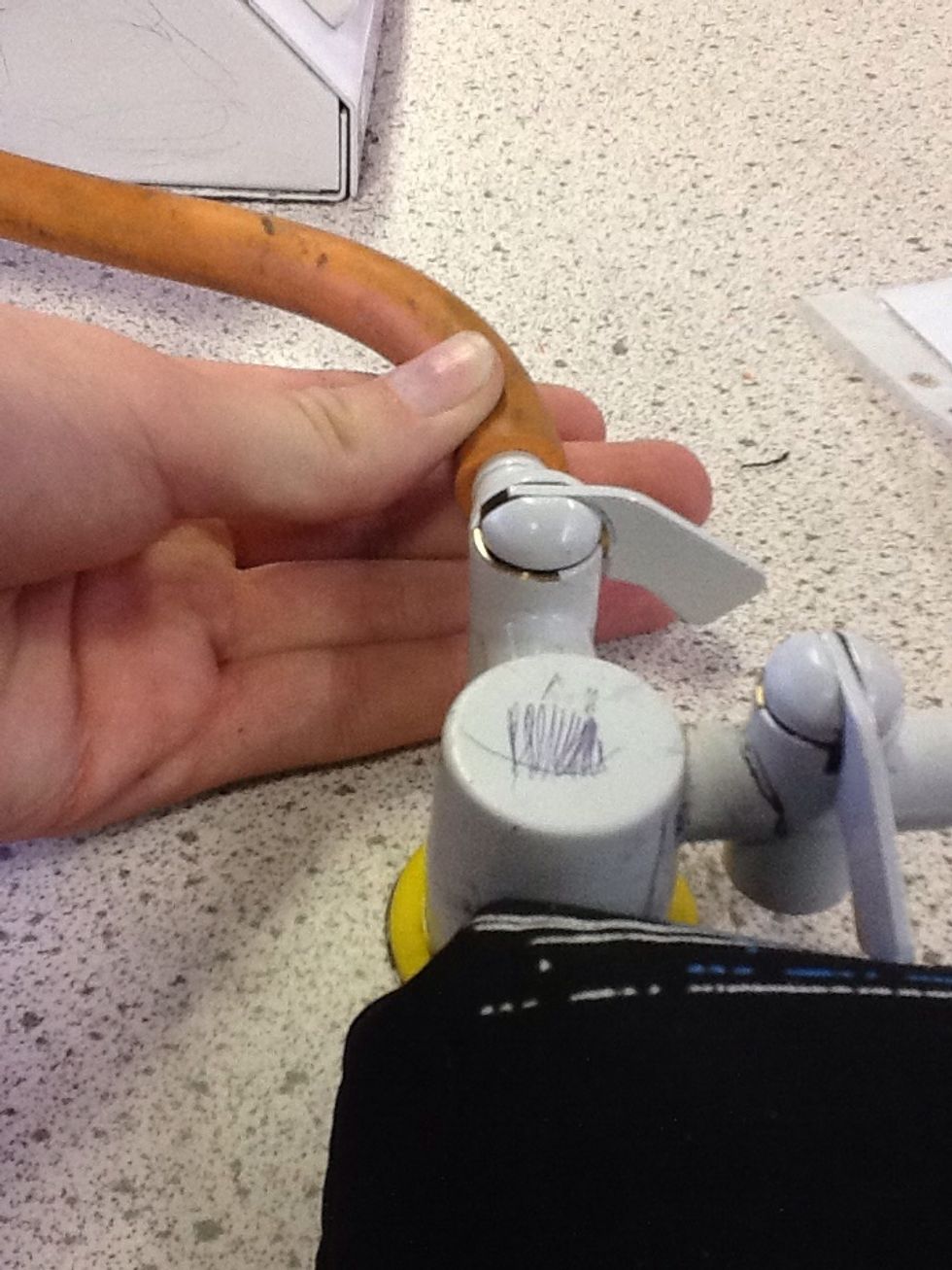 Turn your gas tap on once you have attached the Bunsen burner to it,