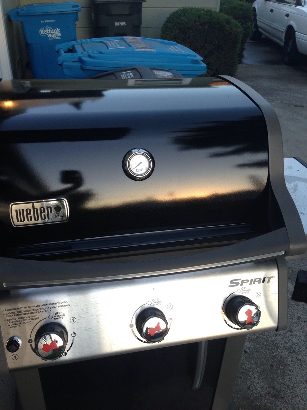 Turn your grill burners on high.