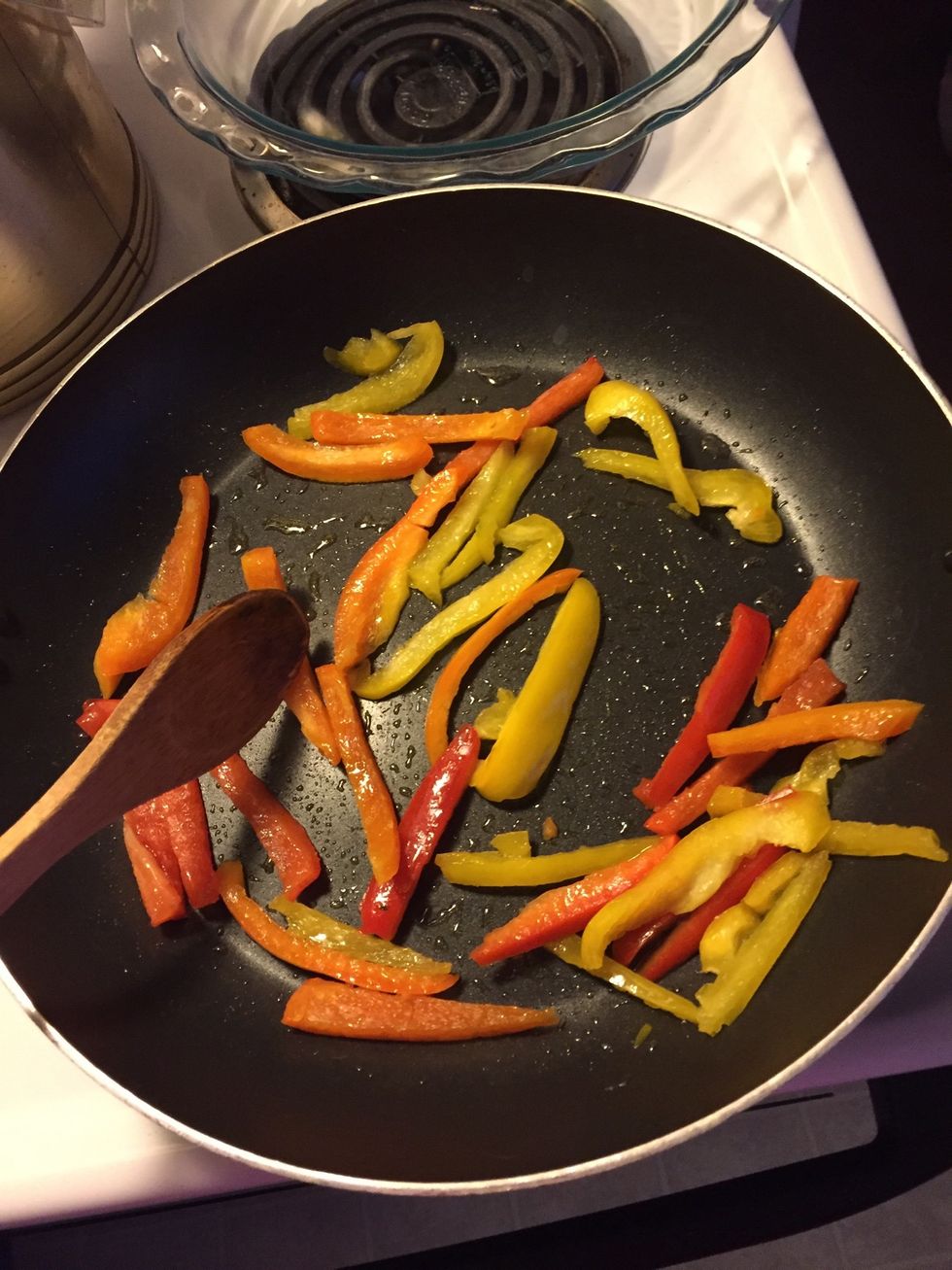 Turn your heat on medium. Stir your peppers in the oil and let saut\u00e9 for 10 minutes