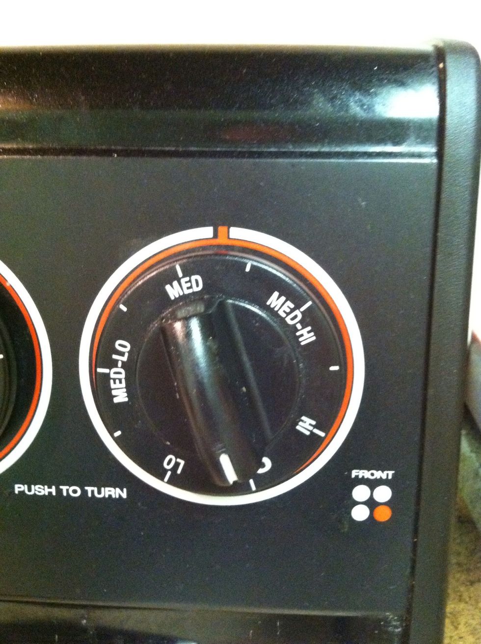 Turn your heat on to about medium. I know it's tempting but please don't put it in high!.