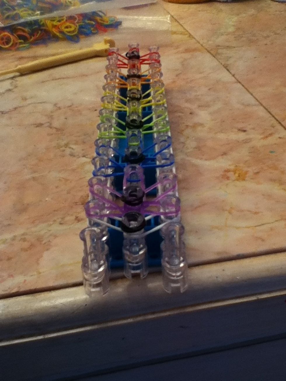 Turn your loom around! Now the arrow should be pointing at you.