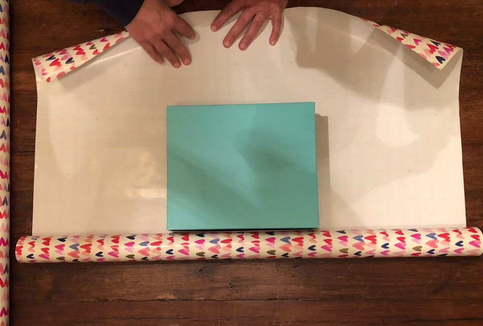 Turn your present over so that when they open it, it will be right-side-up.