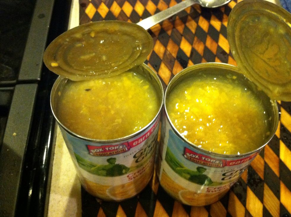 Turn your stove back on to medium heat and add two cans of sweet corn ( cream style) along with the shredded chicken and the bullion.