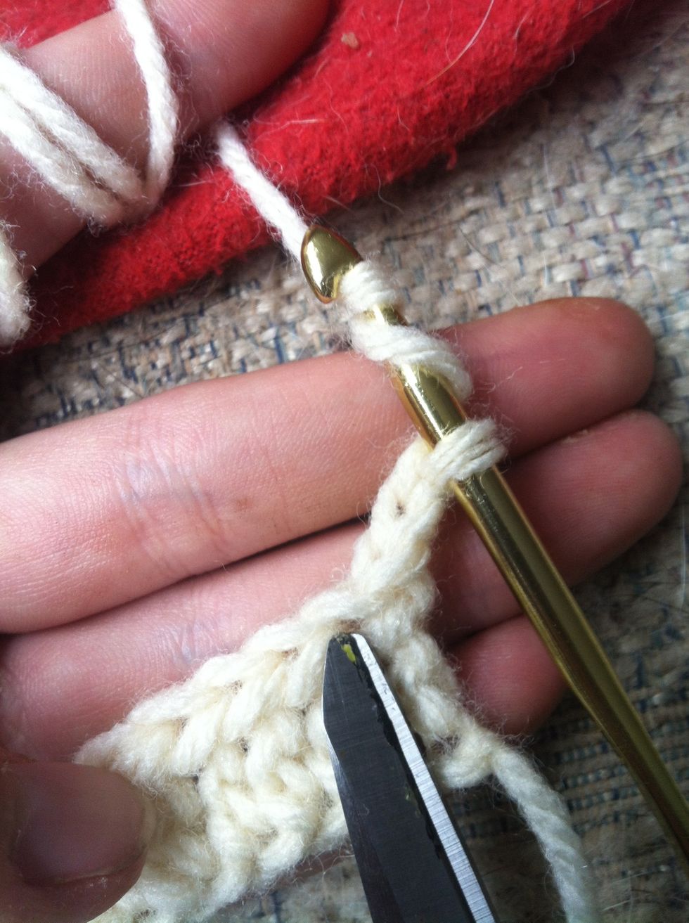 turn your work clockwise. yarn around twice and insert your hook in the top loops of the half treble crochet of your previous row.