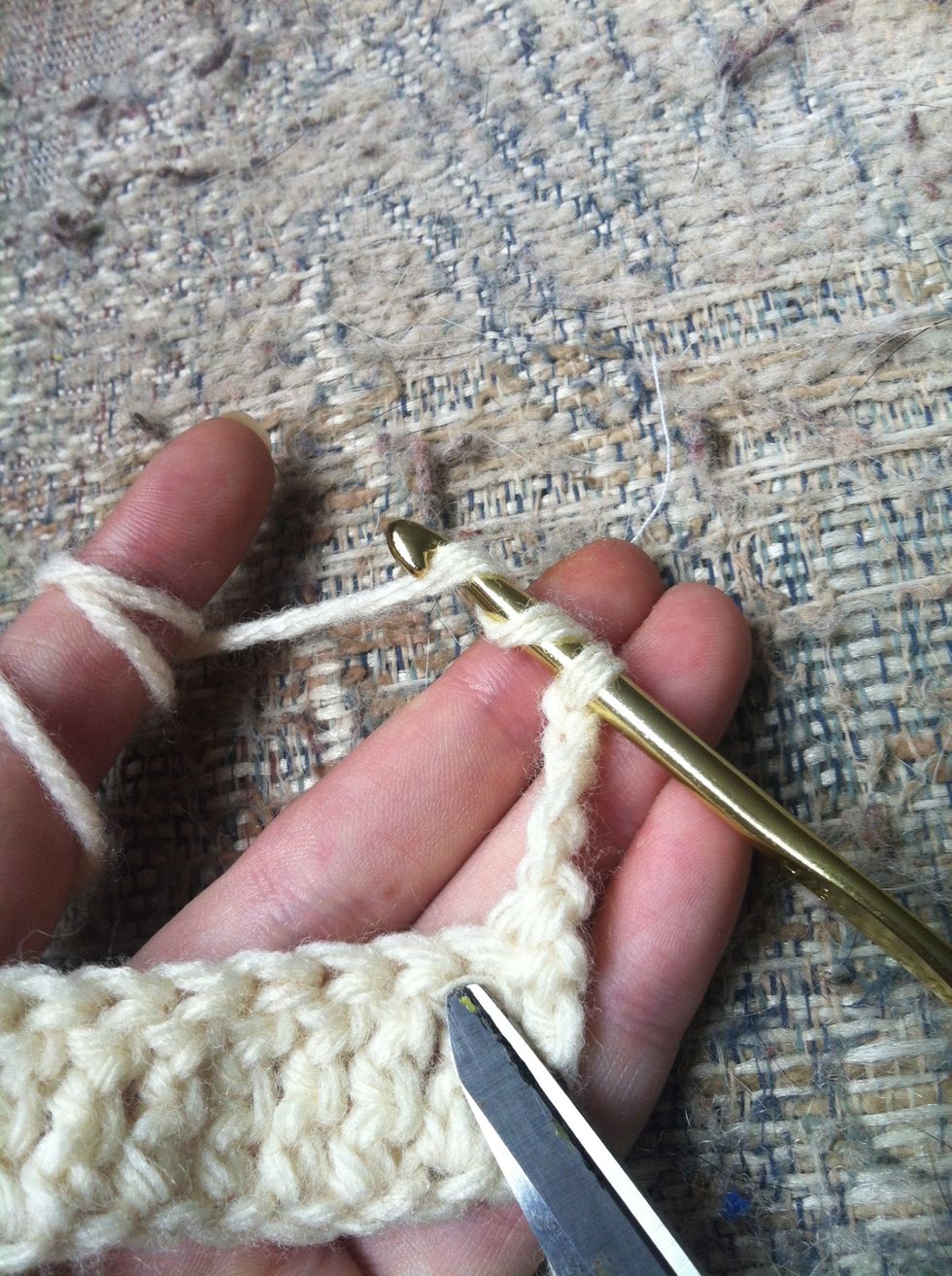 turn your work clockwise. yarn around twice and insert your hook through the top of the last treble crochet of your previous row.