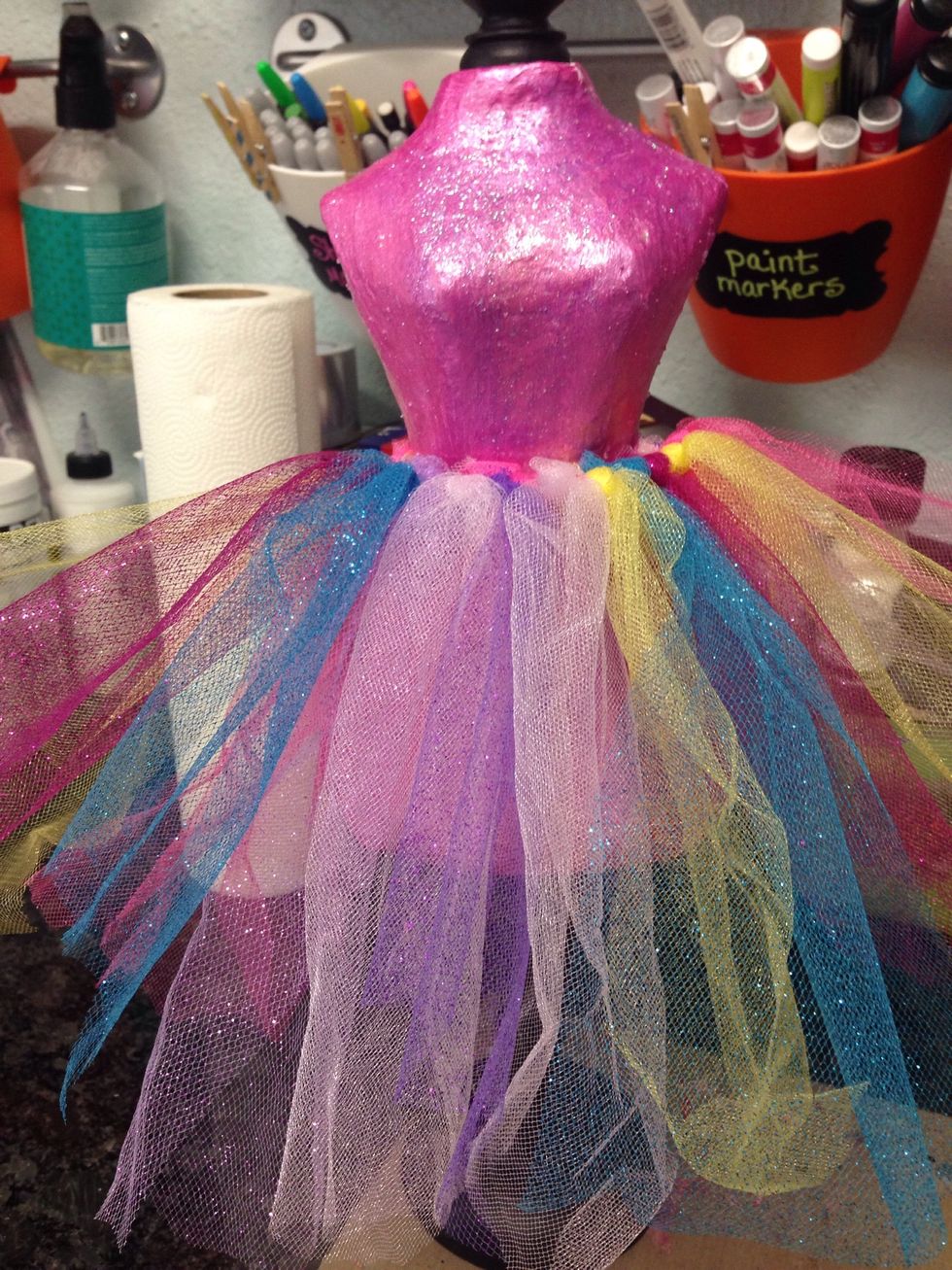 Tutu has been assembled and tied with the ends of the ribbon. I cut off the tips where I had tied the knot and tucked everything in nice and neat