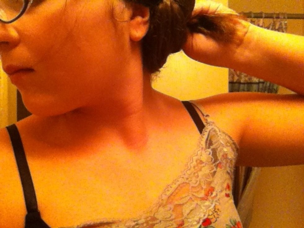 Twirl it around in a bun .