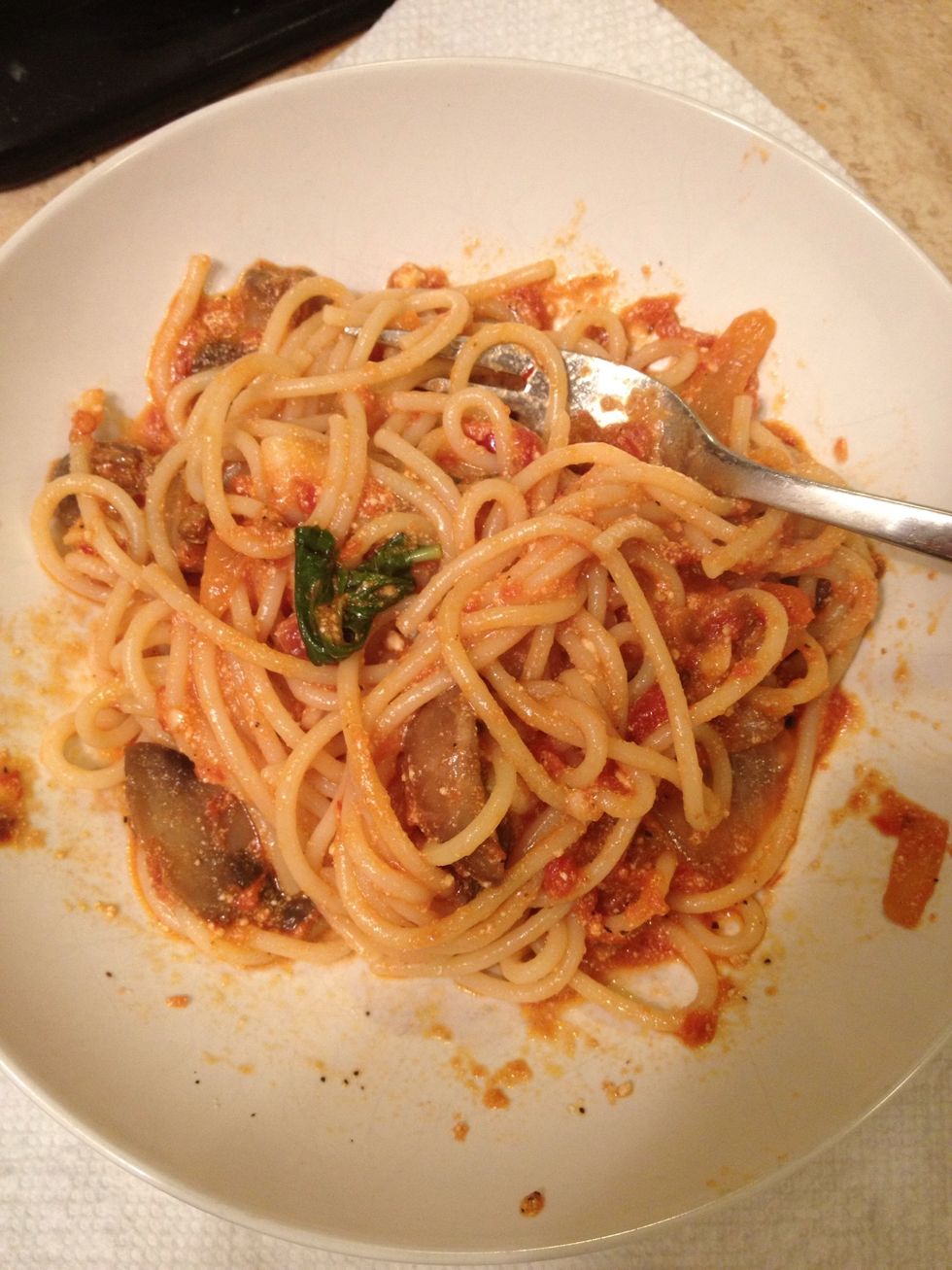 Twirl it up and enjoy!!!! Check out those baby bella mushrooms swimming around the noodle strands covered with the tiny bits of ricotta cheese. The basil is so aromatic. Slurp away my friends. Delish!