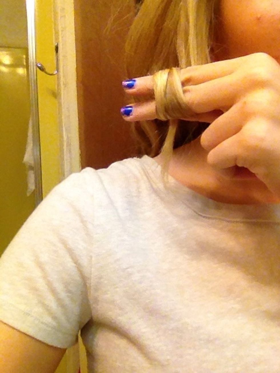 Twirl the hair around your fingers...