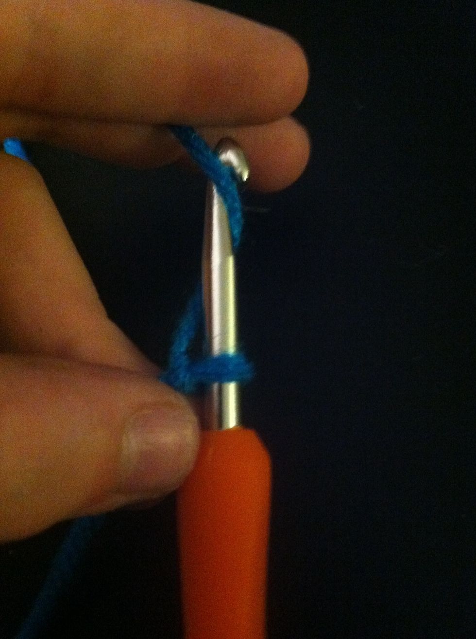 Twirl the yarn around the hook put not all the way