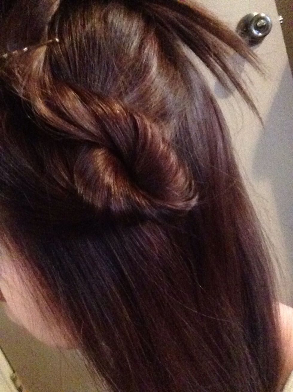 Twist and Pin up top layer of your hair. Separating it into sections is the key.