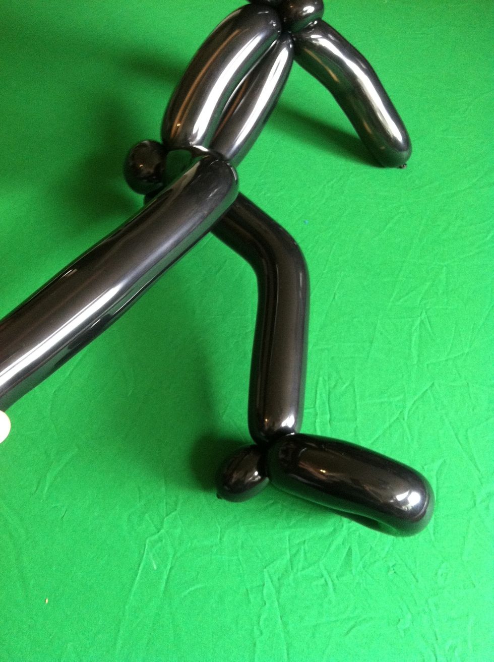 Twist basic loops at base of legs.  It's ok if feet are a little big- he's got big shoes to fill ;-)