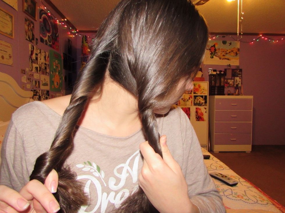 Twist both sections away from your face.