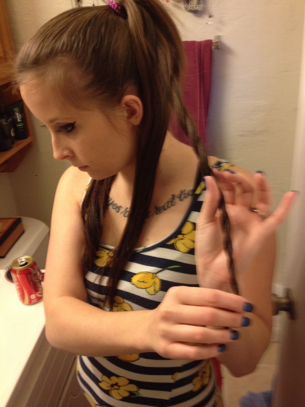 Twist each section...NOT tight or else it will not work!! Keep your twists loose so you can pull and play with them when you're done. This is my first section.