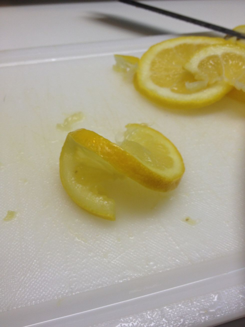 Twist ends outward to get this look. Arrange on top, center of cake.