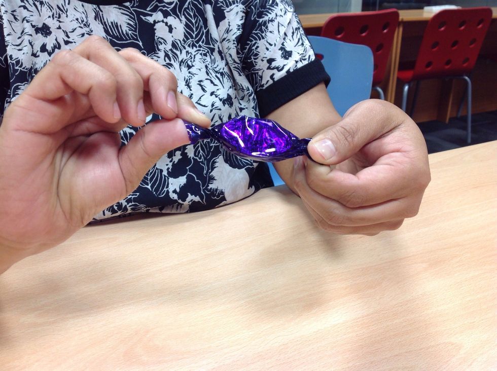 Twist one hand forward and the other hand backward