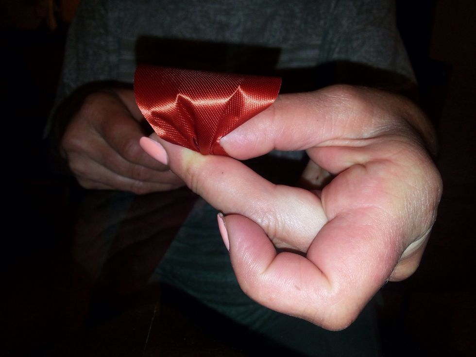 Twist ribbon at the base of the loop