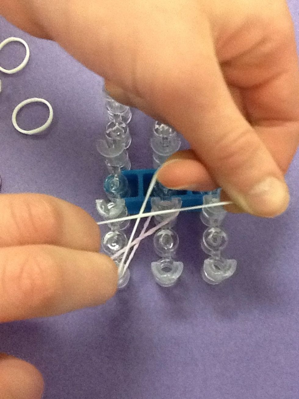 Twist second band into a figure eight.