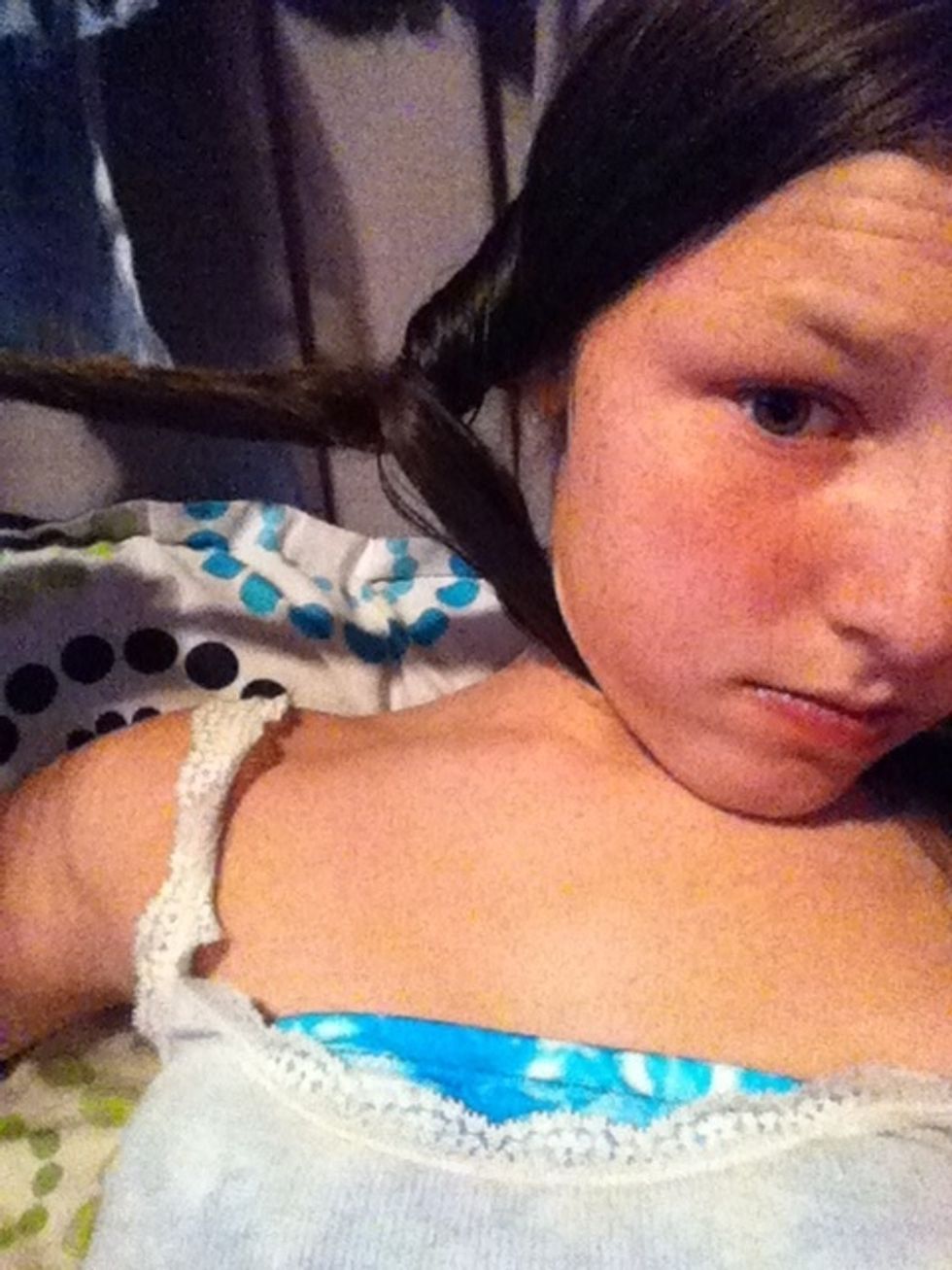 Twist the back piece put in front.