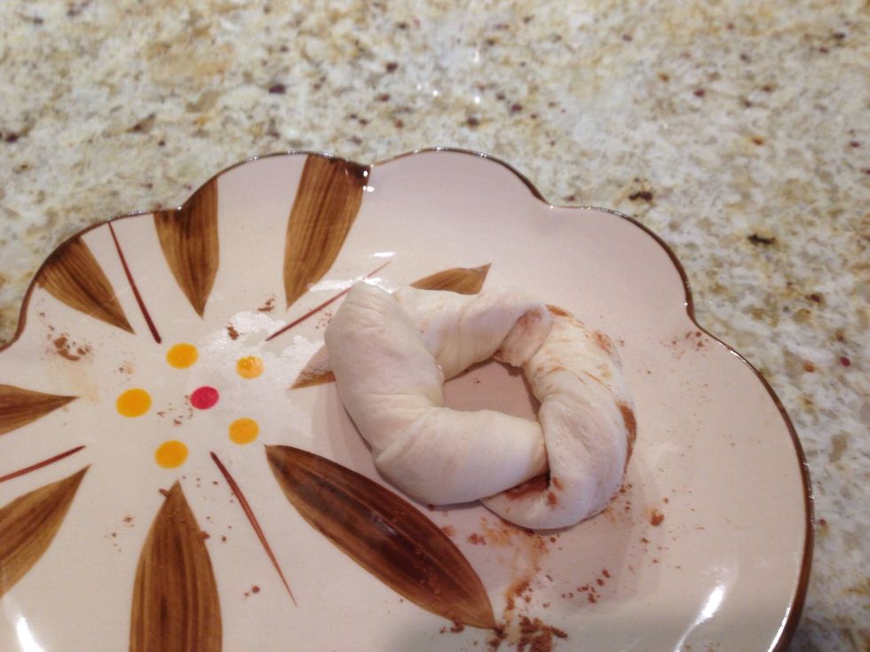 Twist the dough and mash the ends together.