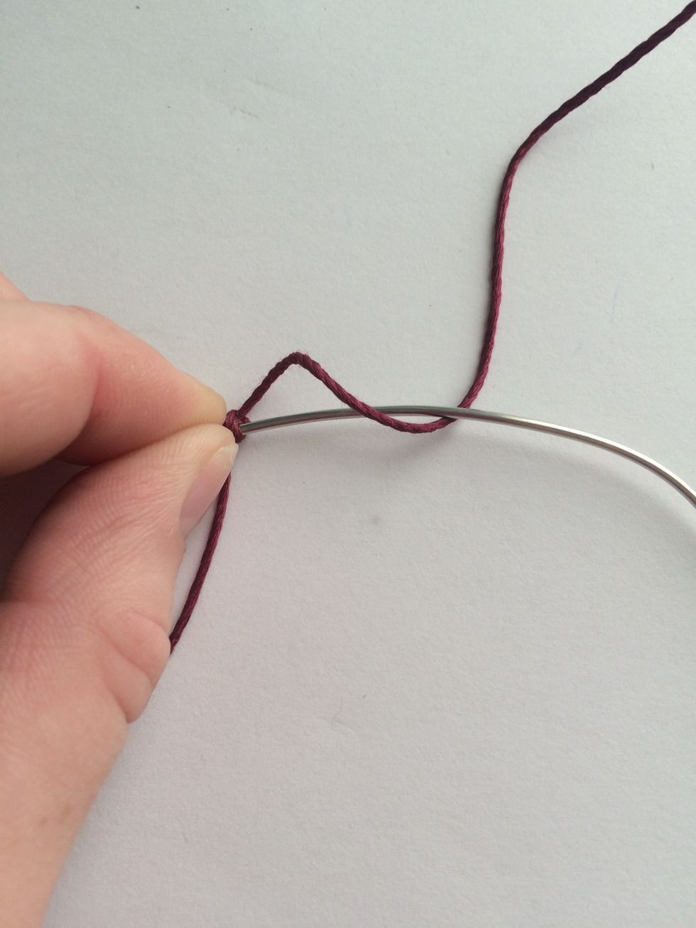 Twist the string towards you