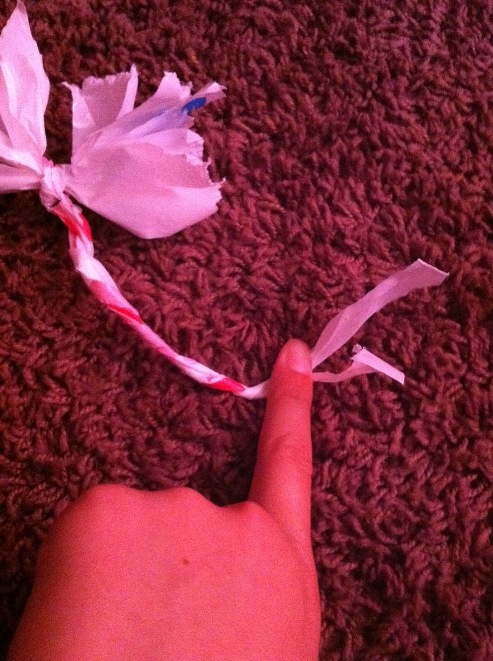 Twist the tails around each other like a rope