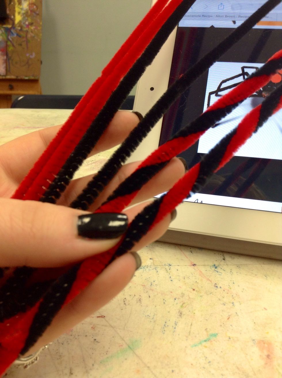 Twist up some pipe cleaner legs or don't twist them and use a solid color. Whatever spins your web!