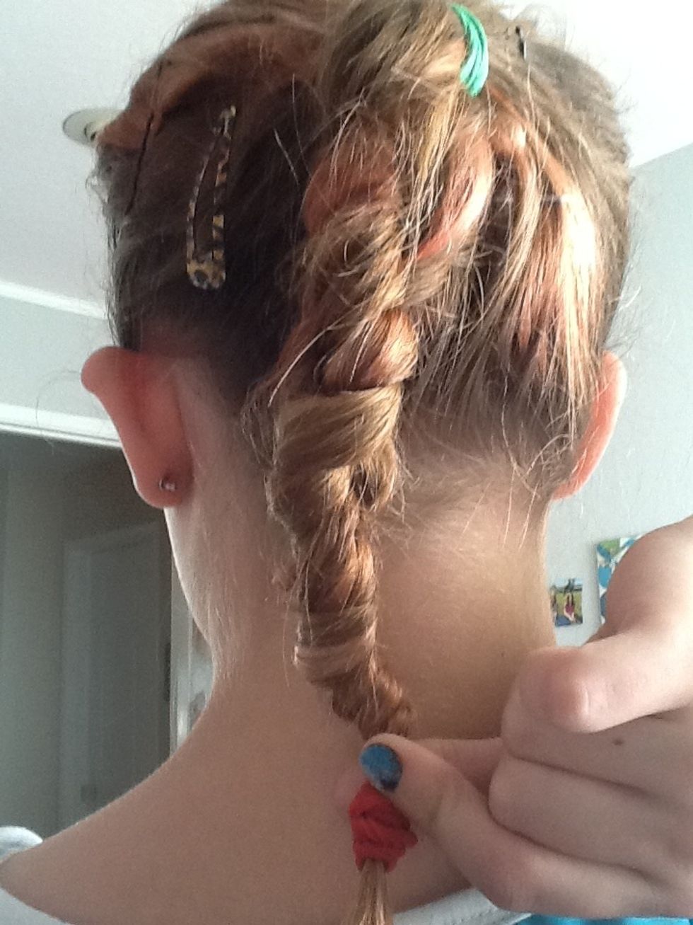 twist your braid, and then put it up into a bun