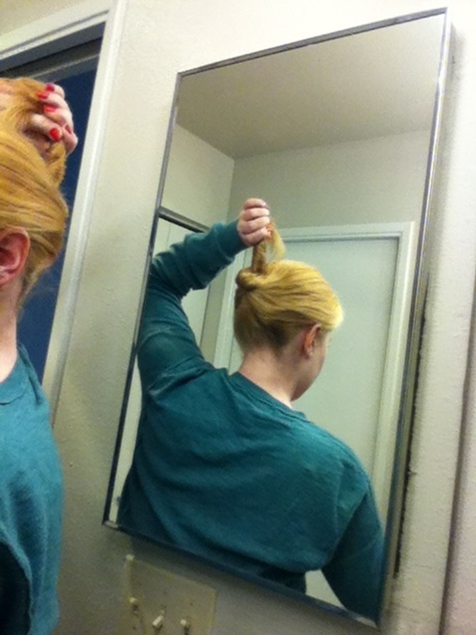 Twist your ponytail from the end so it looks like this