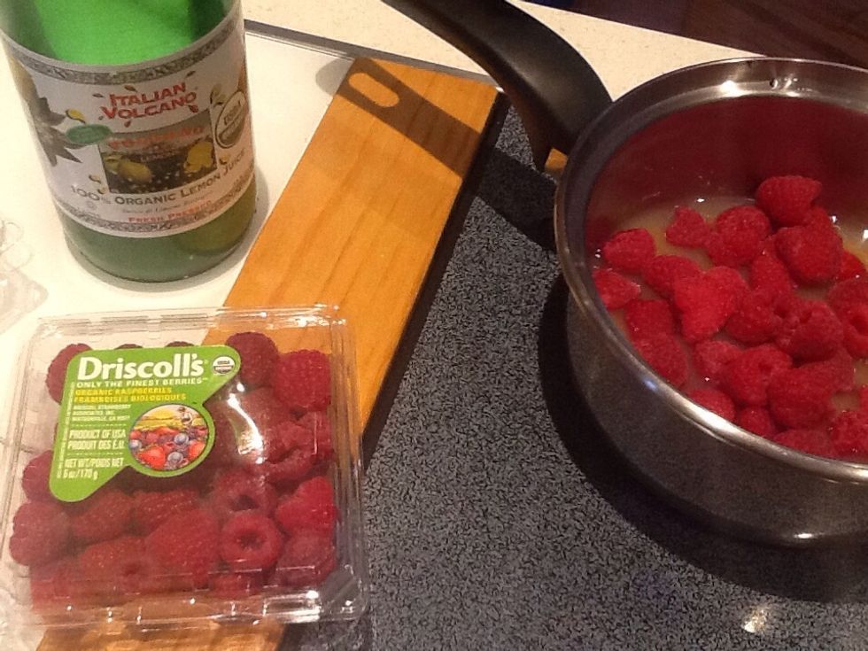 Two boxes organic raspberries, water and lemon juice, enough to make 2 cups. I sweetened with pure Stevia, using 8 scoops. Heat in pan until raspberries break apart.