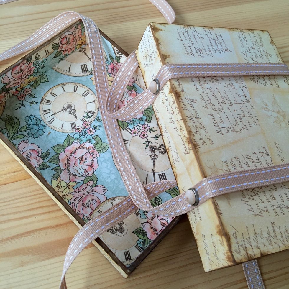 Two brads in each side of the box.