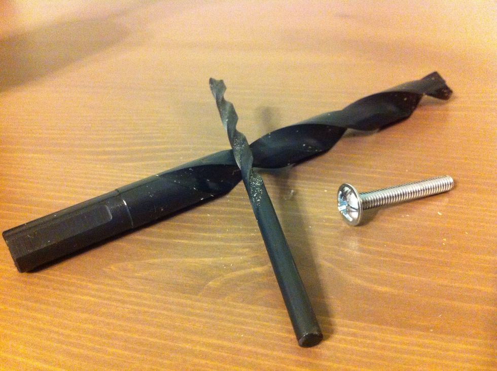 Two drill bits - one the size of the bolt shaft, and one the size of the head.