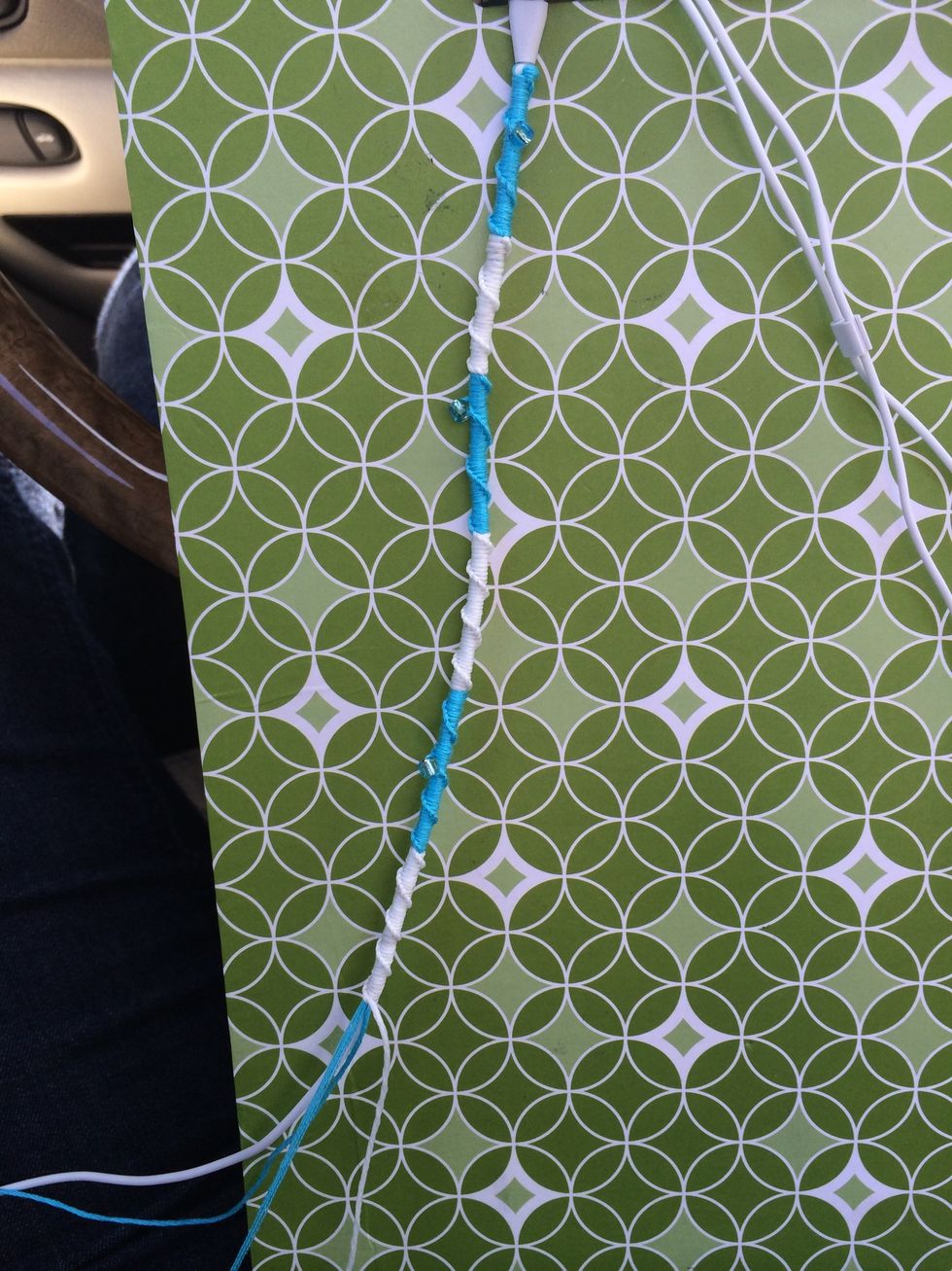 Two more white sections and a blue. Still knotting on, lol