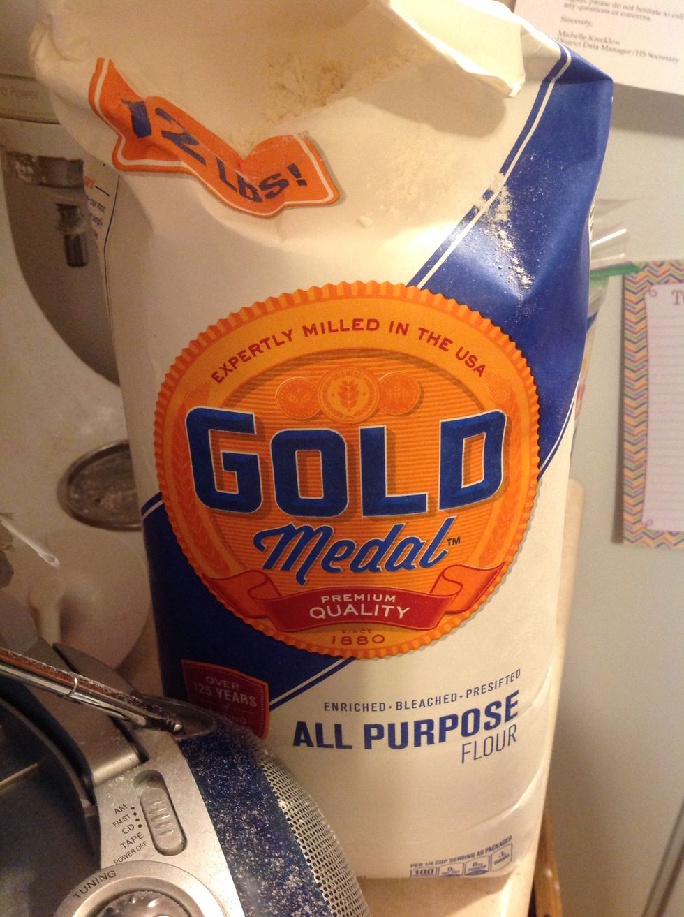 Two: Pour 2 1/4 cups of flour into the bowl.