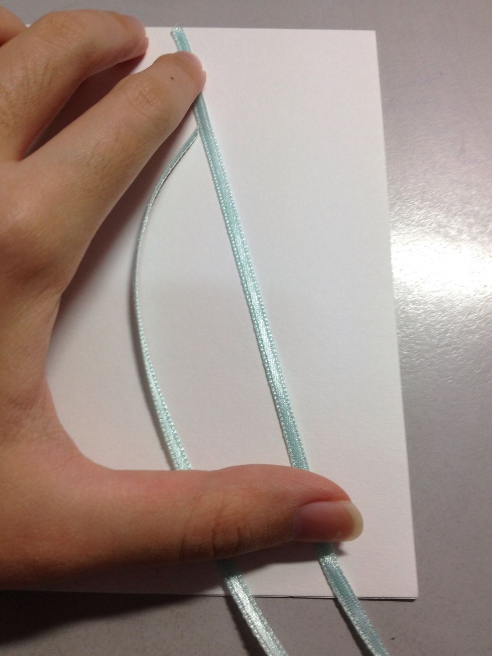 Two ribbons covering mid-length...