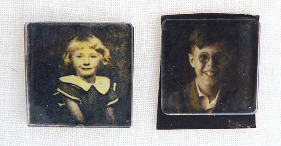 Two small vintage photos and square acrylic blocks.