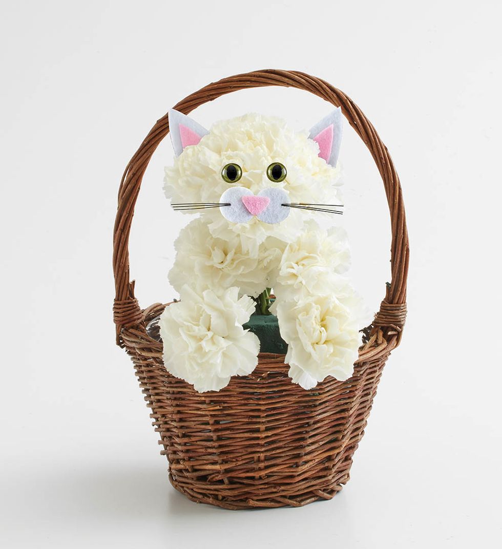 Two triangle ears. \u2014 *This accessory will be used for spring in our \u201cHoppy\u201d arrangement; this is the reason for the length of the ears.