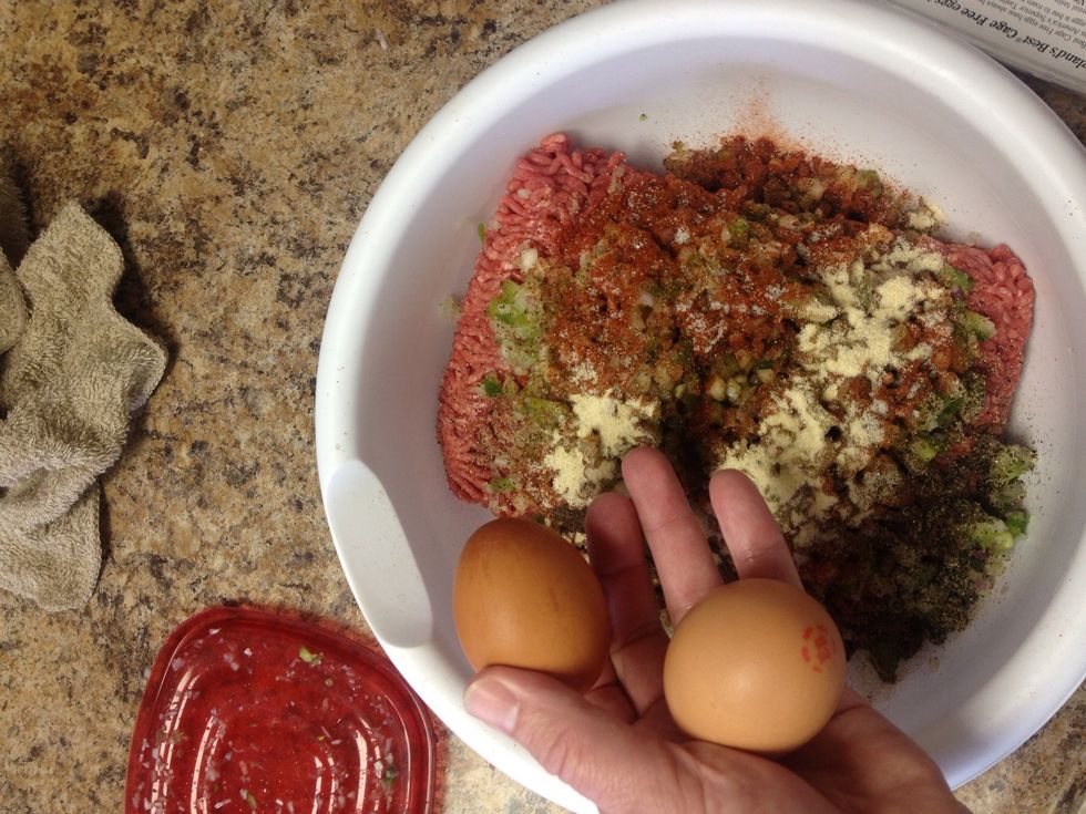 Two whole eggs. I use brown. Any type is fine.