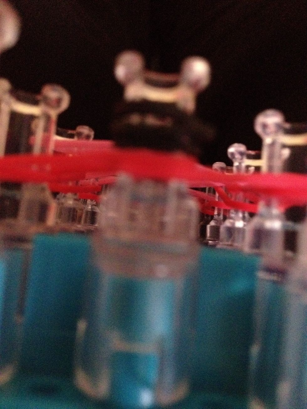 U r going 2 take the second last rubber band and bring it over to the left Them repeat but take the last rubber band and take it to the right