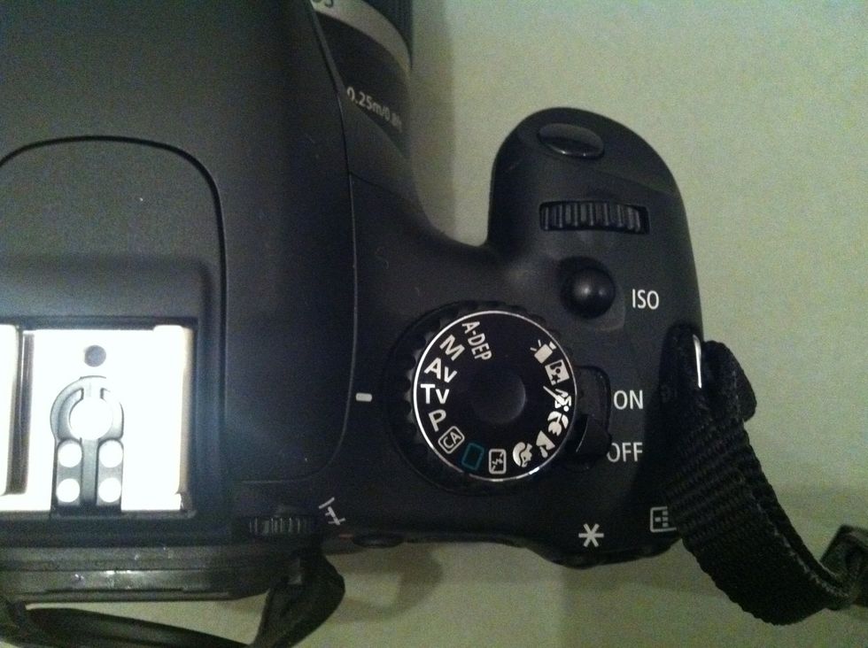 \u0646\u0636\u0628\u0637 \u0627\u0644\u0648\u0636\u0639\u064a\u0629 \u0639\u0644\u0649 \u0627\u0644\u062e\u064a\u0627\u0631 (TV) \u0623\u0648 (M) \u0644\u0644\u062a\u062d\u0643\u0645 \u0628\u0633\u0631\u0639\u0629 \u0627\u0644\u063a\u0627\u0644\u0642 shuter speed