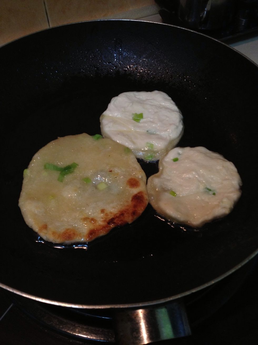 \u2022 Pour a small amount of oil on the frying pan until its hot \u2022 put the pancakes into the frying pan and fry it \u2022 fry each side for few minutes. flip it so it cook on both side