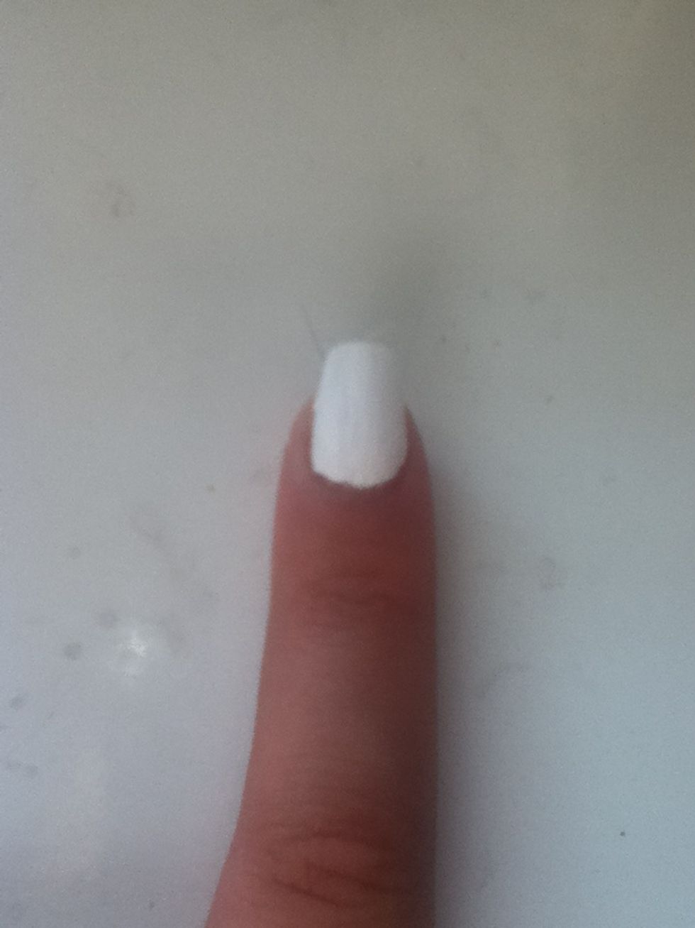 \ud83d\udc85 Paint your nail white.