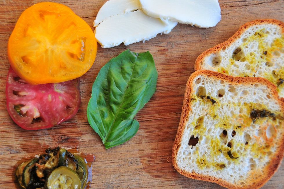 Udi's GF bread is the best we have tried - it toasts up perfectly.  I drizzled a little oil from the roasted zucchini on the bread then toasted it in my toaster oven before melting the mozzarella.