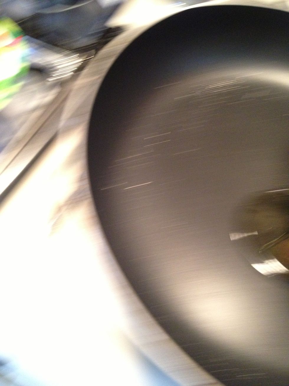 Ugh another blurry pic, sorry guys. Well add 1/4 cup of olive oil to another pan over medium high heat.
