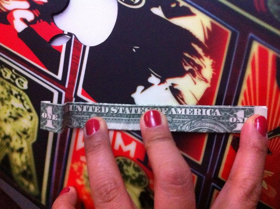 Un roll the curve and lay it flat with the square piece "1" on the left side.