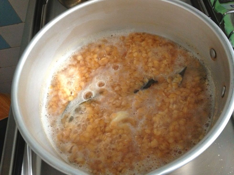 Uncover. Let it simmer for 20 minutes or let the water is completely absorbed.